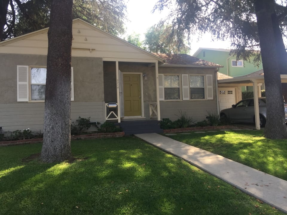 Front yard with car portico & garage (car does not fit in garage)