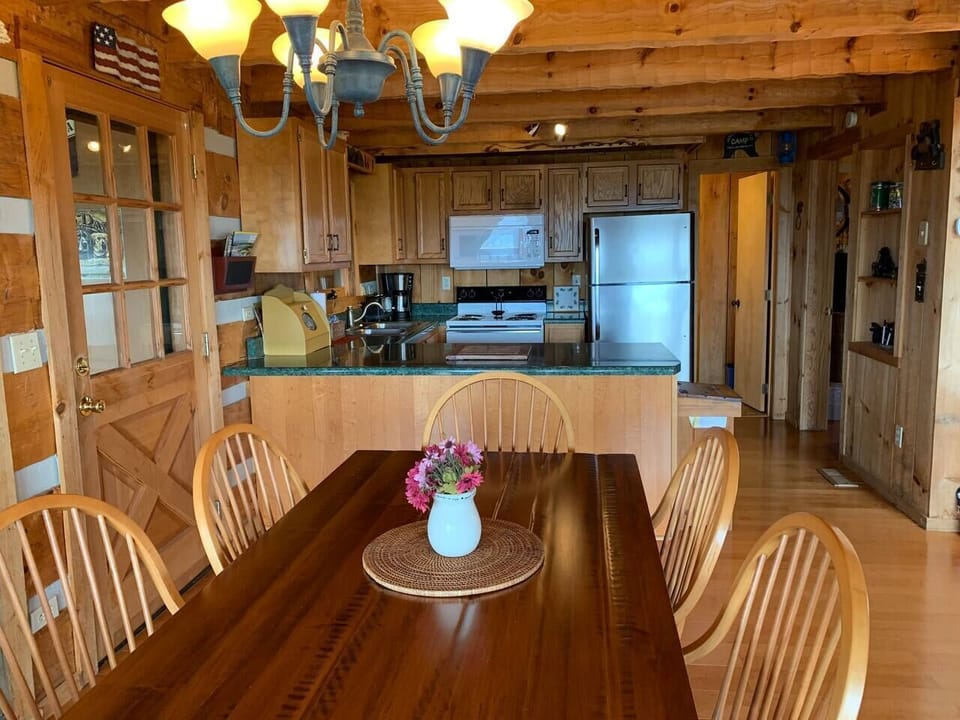 Bright open space with large windows and a lofted ceiling: adds charm and comfort to your stay.