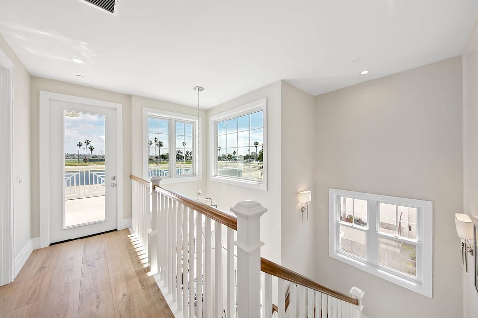 Second level offers great deck, Master bedroom, another bedroom with King bed and laundry room