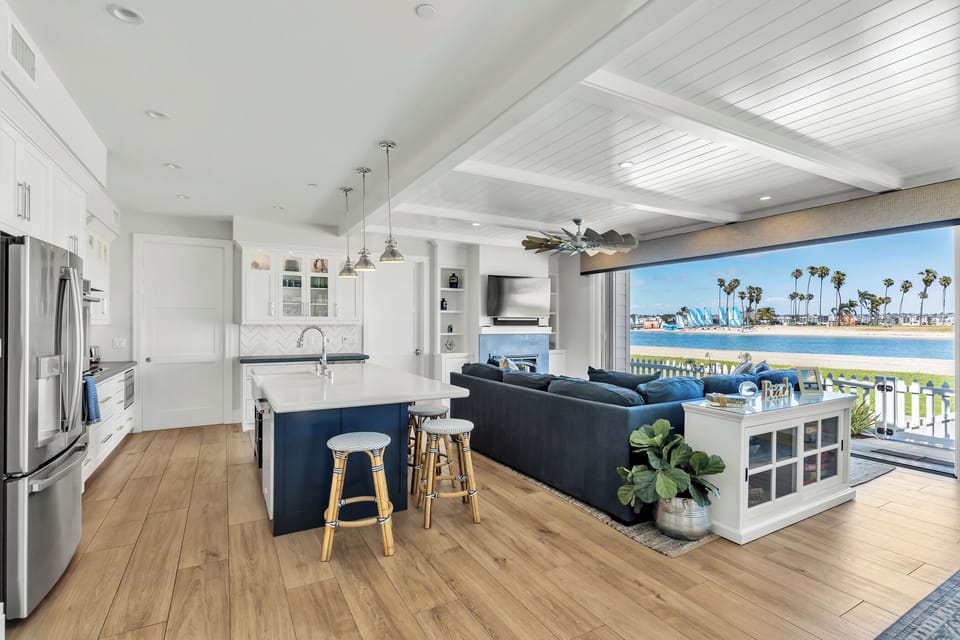 Spacious gathering area with water views throughout