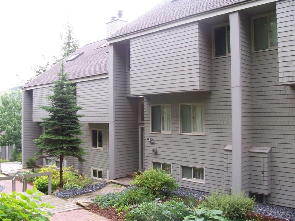 Building is adjacent to trail Two Miles Home (at intersection of Water Tank)