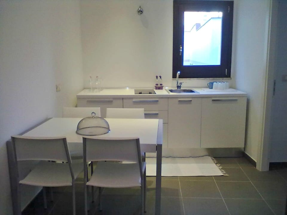 dining area with full equipped kitchen