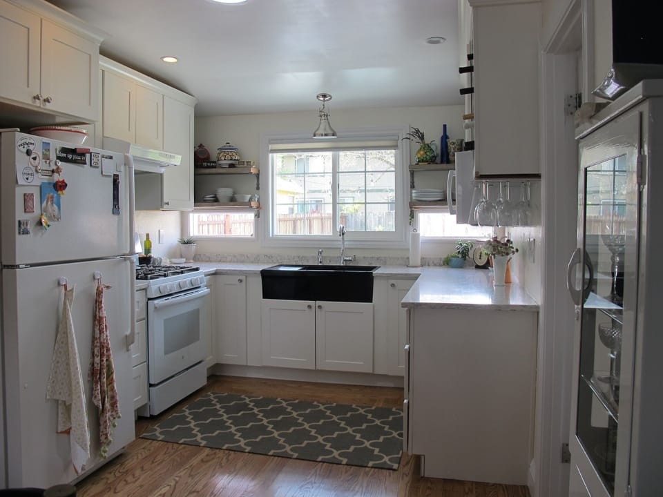 Spacious modern kitchen with gas stove and dishwasher