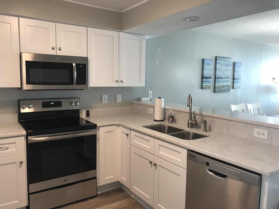 Unit includes dishwasher and garbage disposal