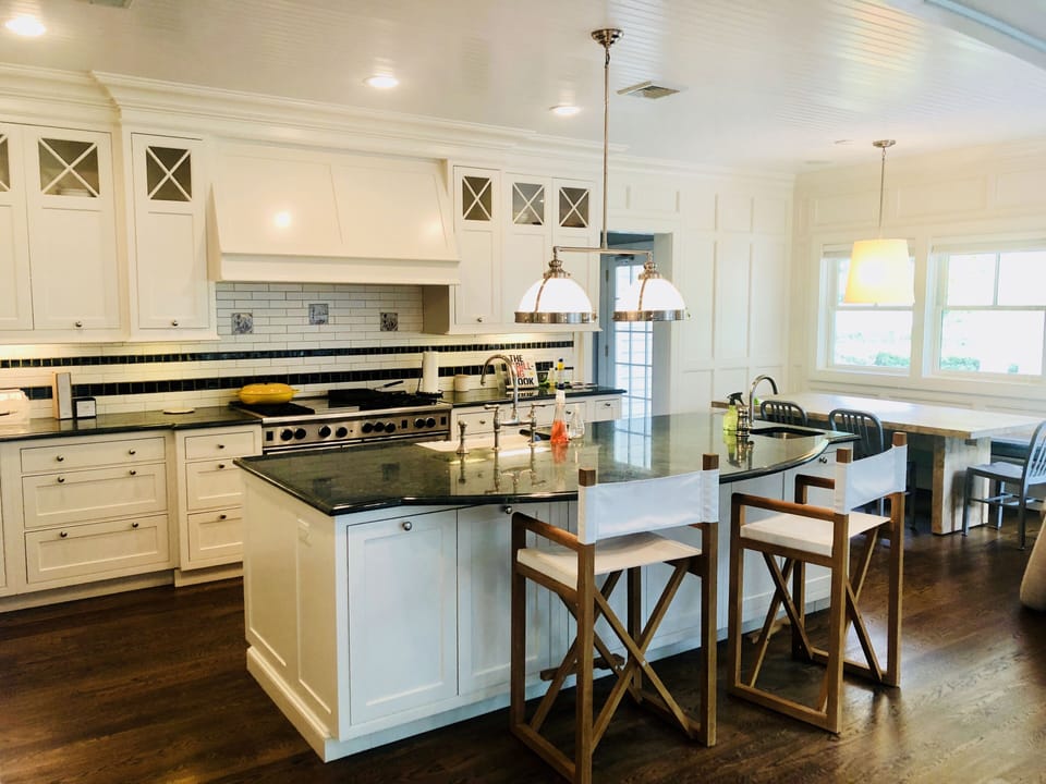 Open kitchen, Wolf stove, 2 dishwashers, and a 7-8 seater breakfast nook