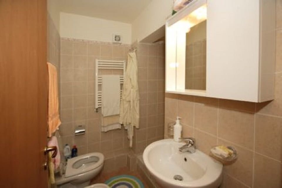 Fully furnished bathroom with shower