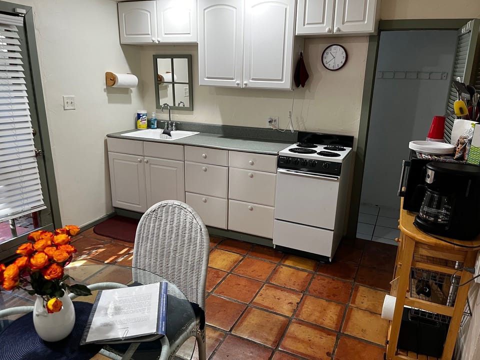 Kitchen is equipped for long-term stays.