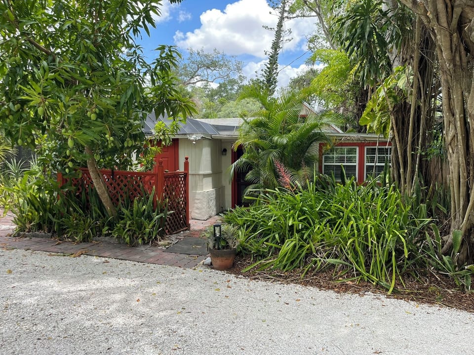 Stay in a tropical paradise. The cottage has its own laundry room.
