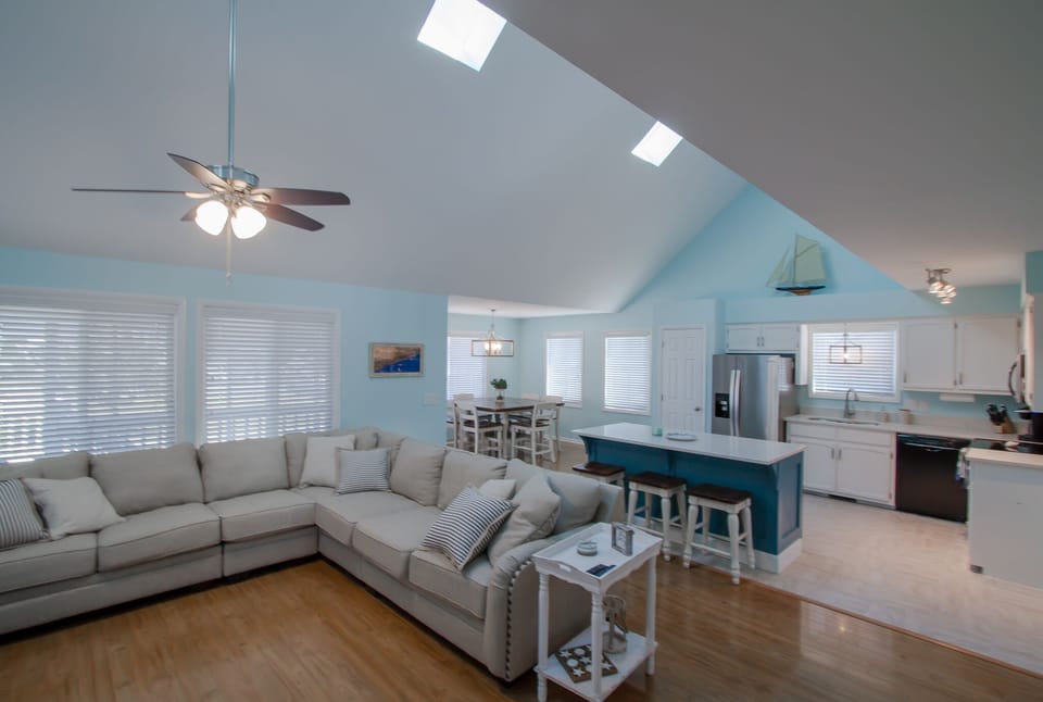 Living room, kitchen with dining area in back
