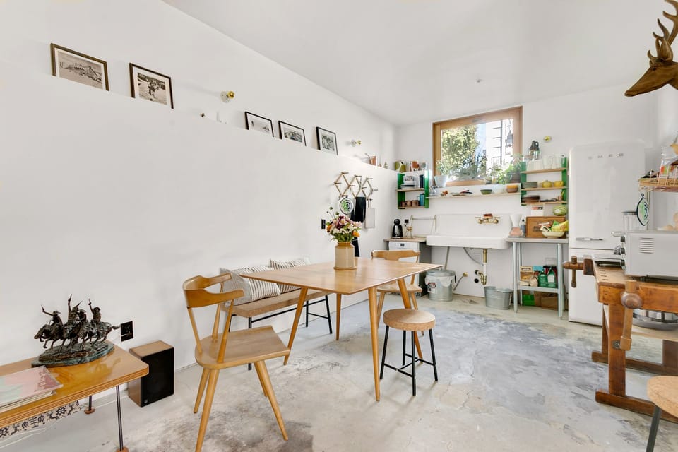 Kitchen: fridge, sink, coffee, microwave, hot plate & toaster oven - NO oven.
