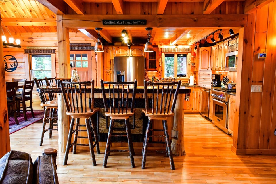 Open concept for entertaining, Kitchen island has rustic bar seating for 5, 