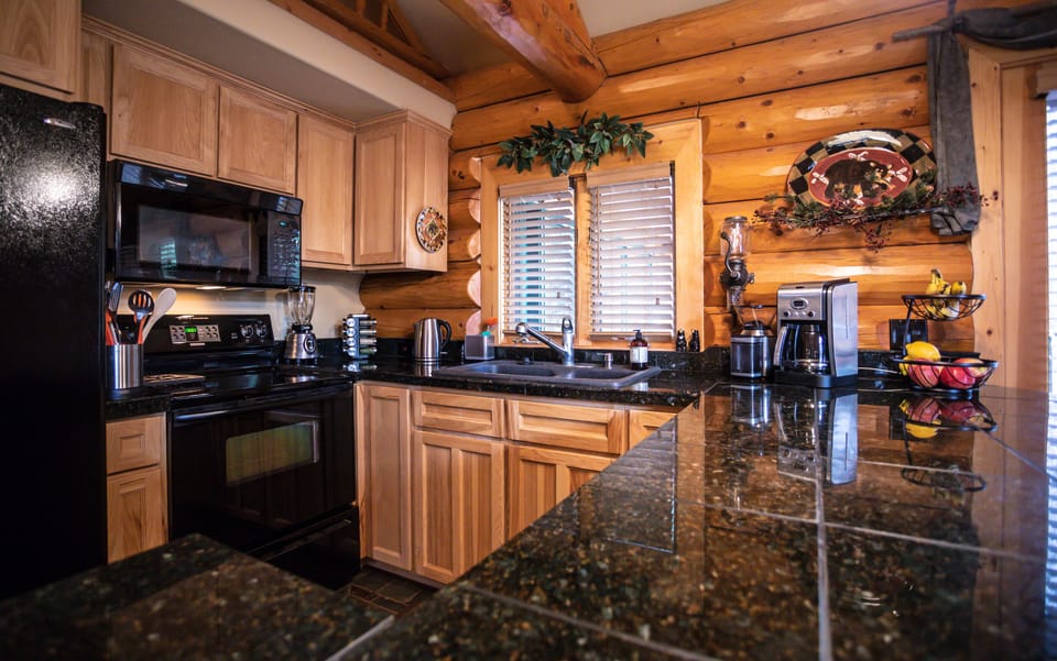 Fully appointed kitchen.  Granite counter tops.  Spices and small appliances.