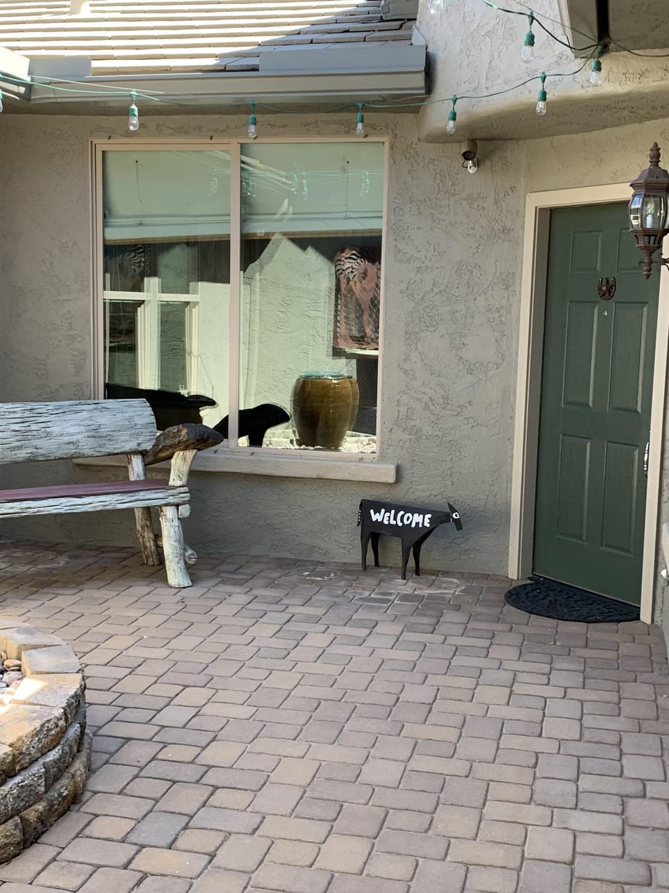 Courtyard has natural gas flame feature and flying pig’s 