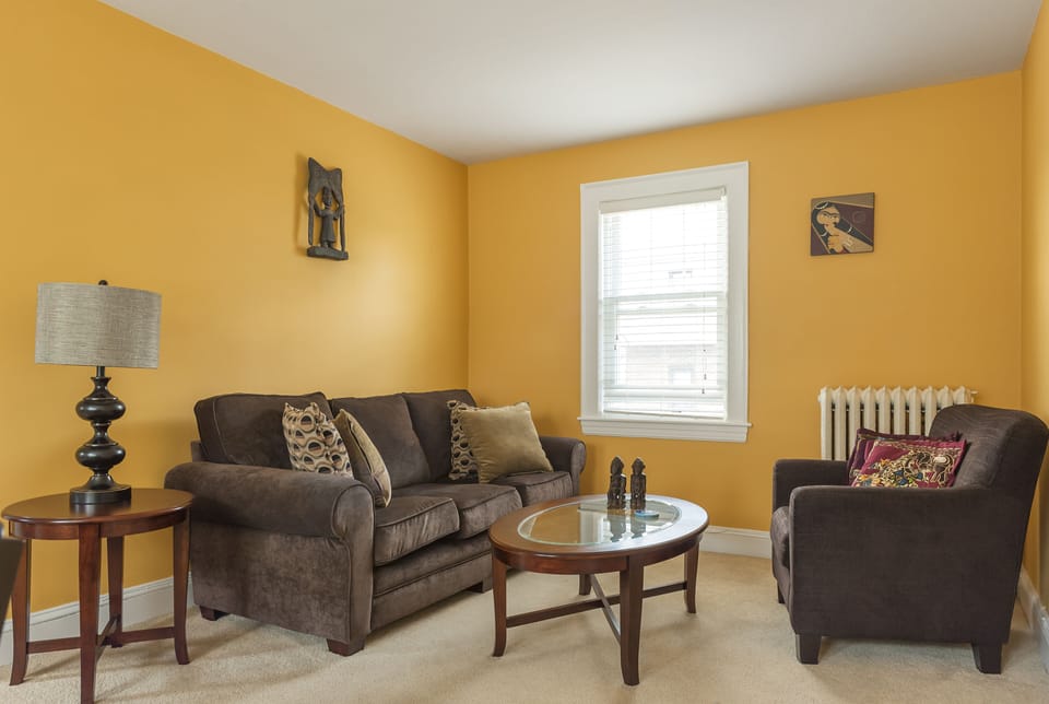 Sofa and love seat in living room. Smart TV with free Netflix. 