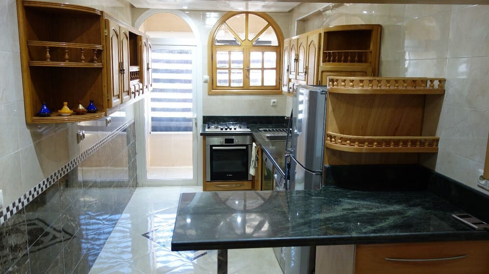 Kitchen Showing Door to 2nd West-Facing Balcony