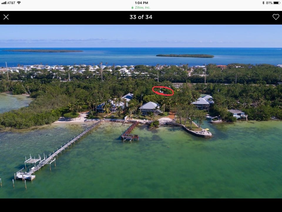 BAY VIEW house is nestled in the trees & only 100 steps to the water's edge!