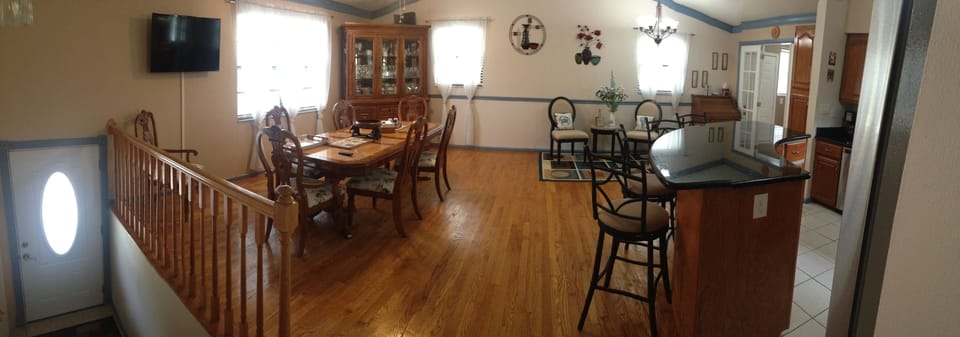 ENTRANCE; DINING ROOM; PARTIAL VIEW OF KITCHEN