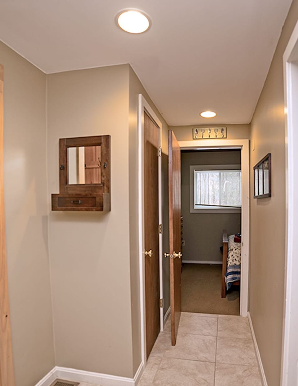 Hallway into home 
bedroom on left-bathroom straight ahead