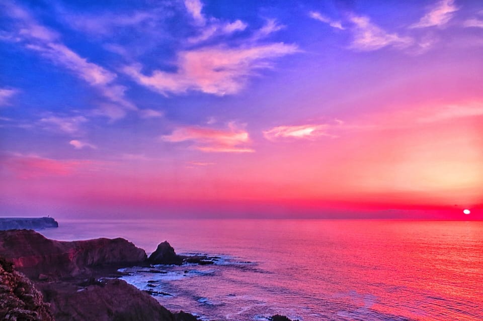 Sunset in Sagres with the Lighthouse on your left side