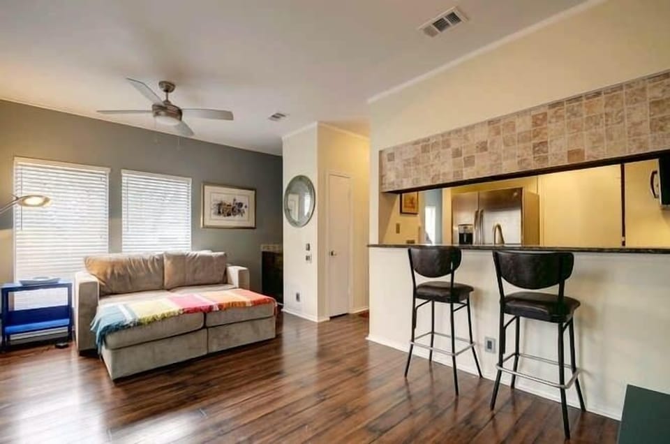 Open kitchen with granite counter-tops.
