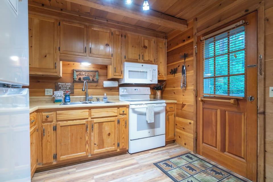Front door leads you straight into the fully stocked kitchen