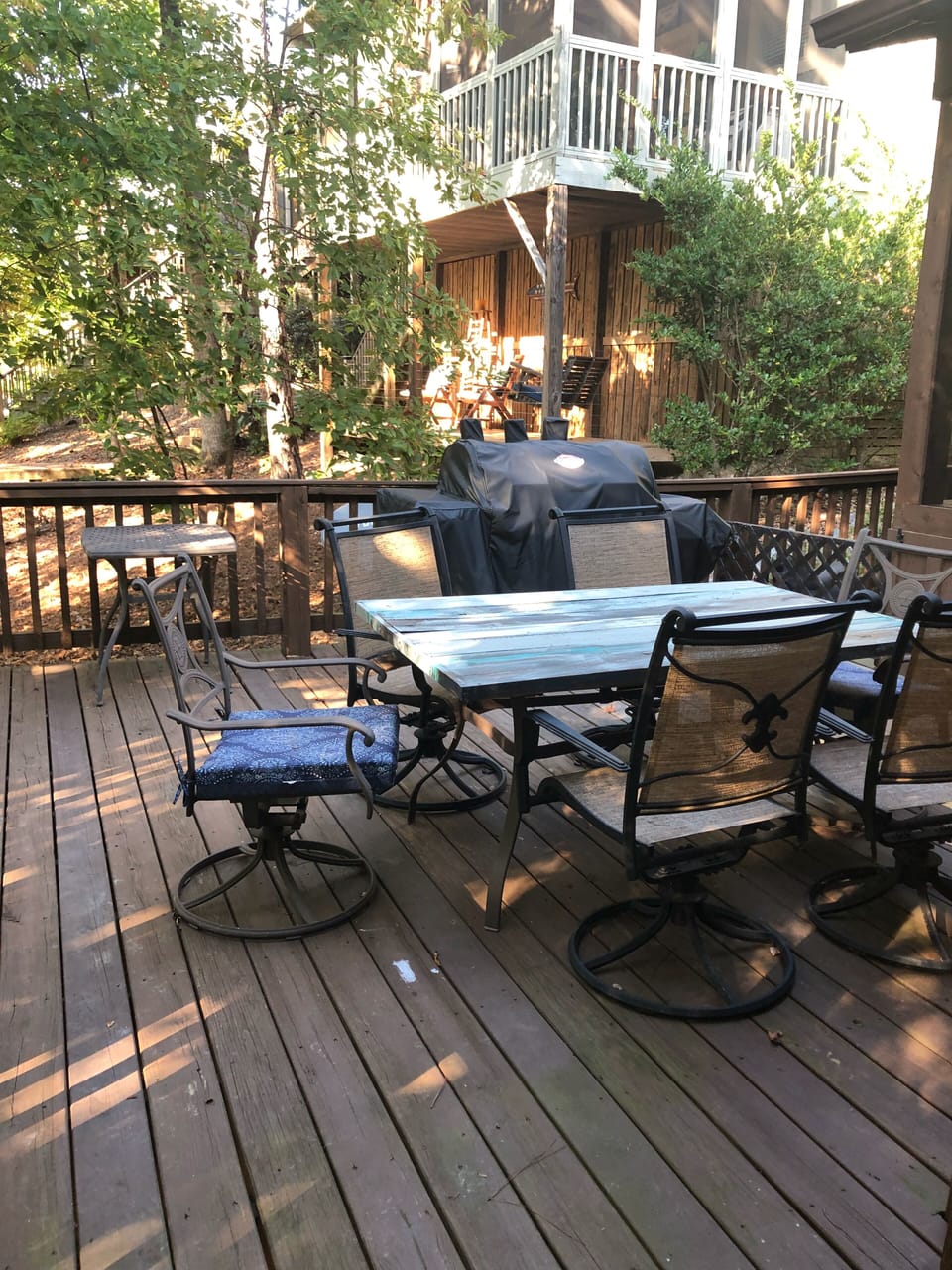 Back deck with grill overlooking the lake