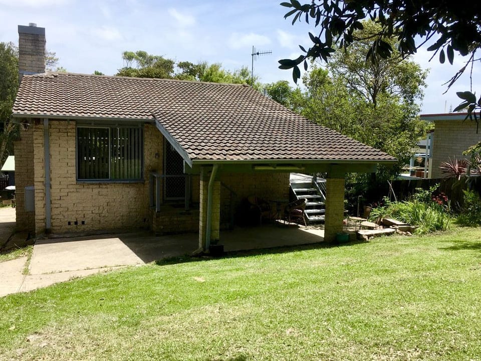 Spacious front yard for parking and boats