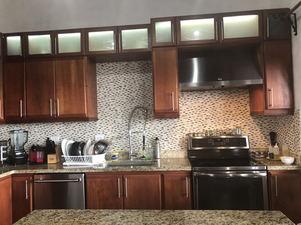 View of kitchen, and some of the appliances 