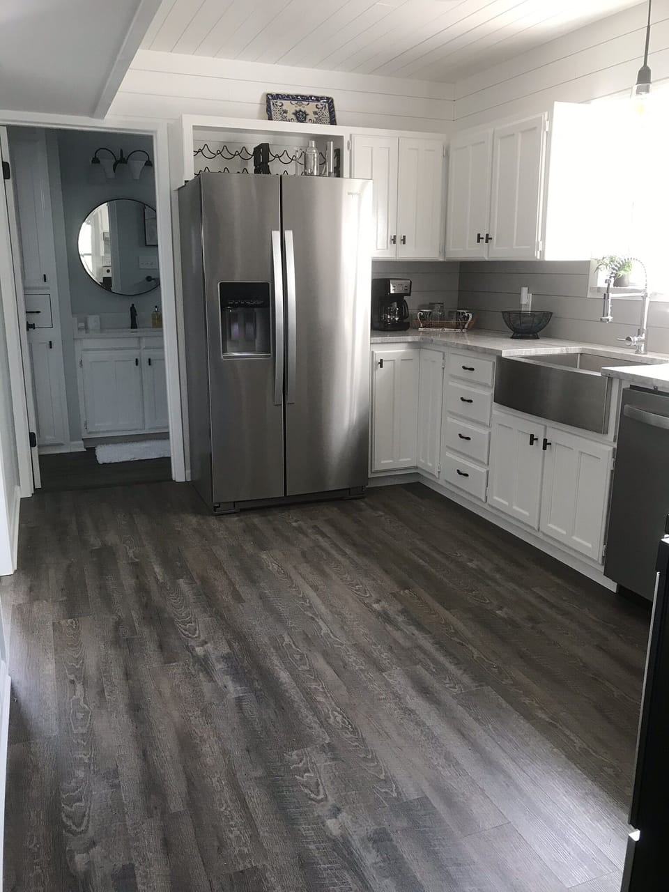 View into kitchen, downstairs bath and bdrm entrance. 