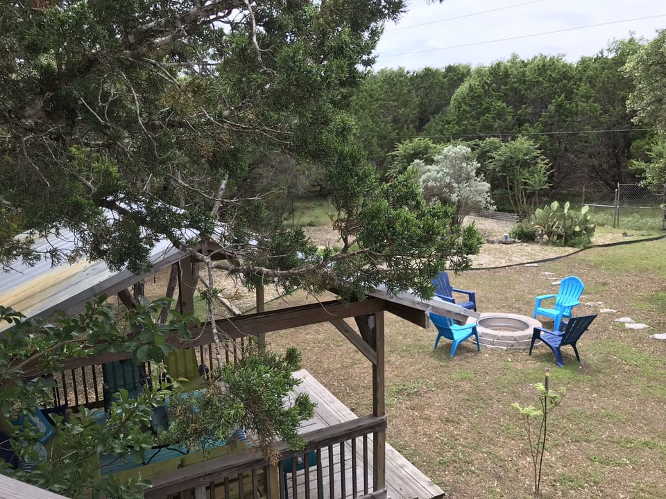 Backyard view from back deck stairs.

