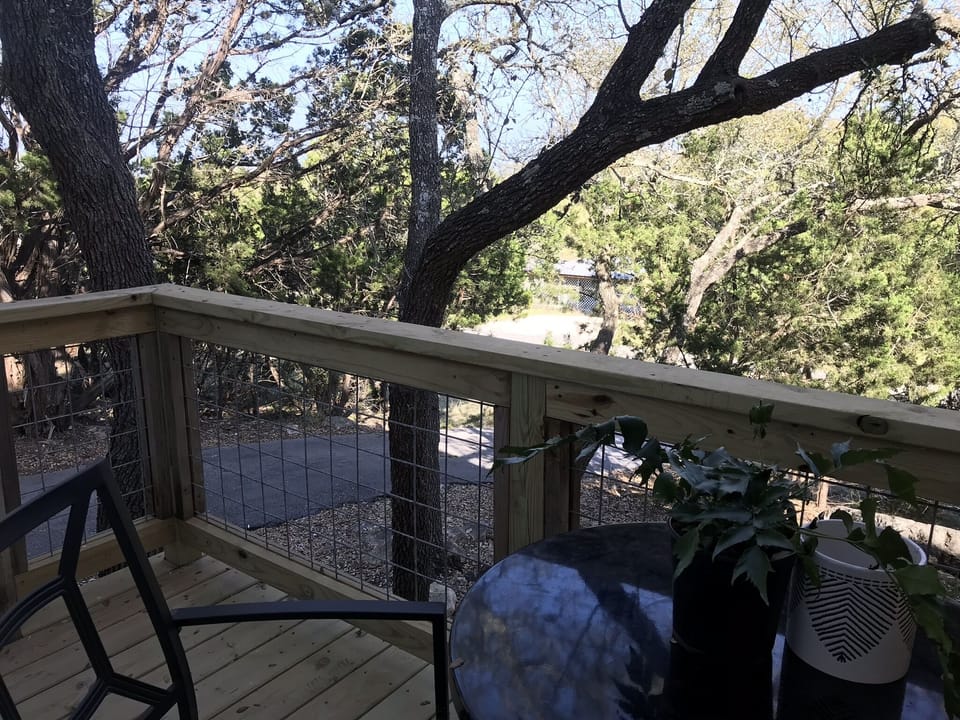 Front porch view- a great spot for a peaceful coffee or cocktail! 