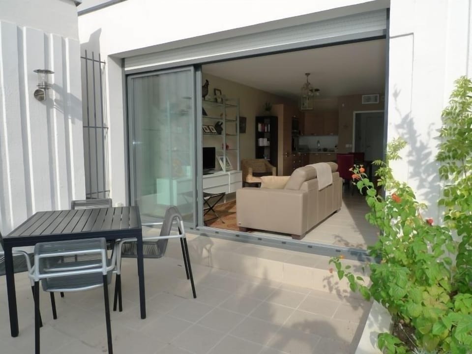 View to living area from one private terrace