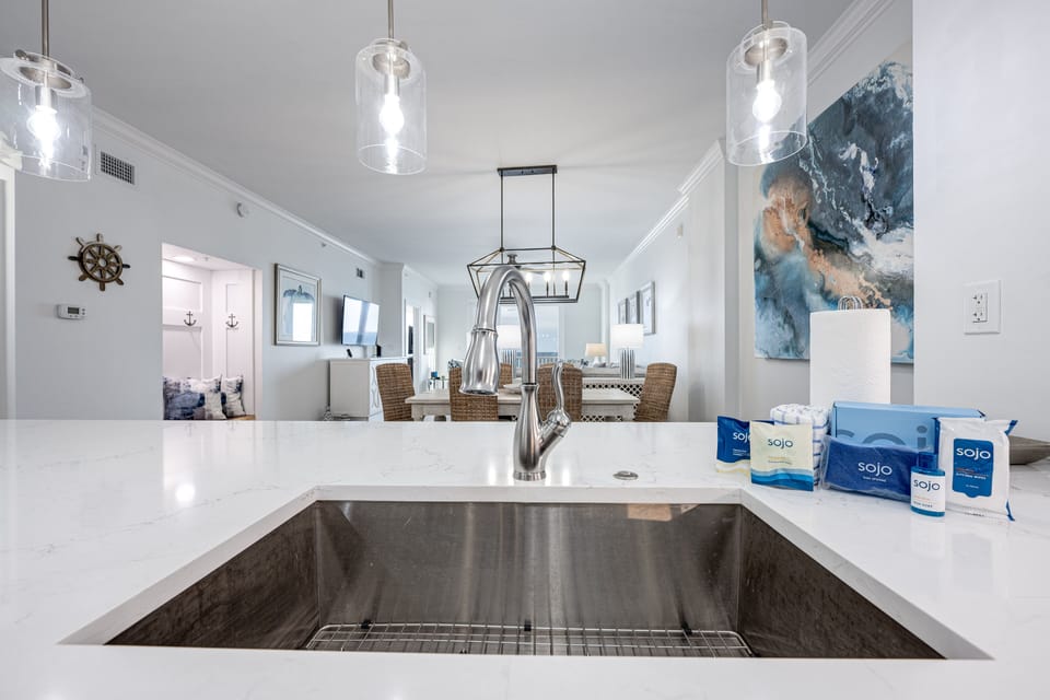 Kitchen view to dining and living areas