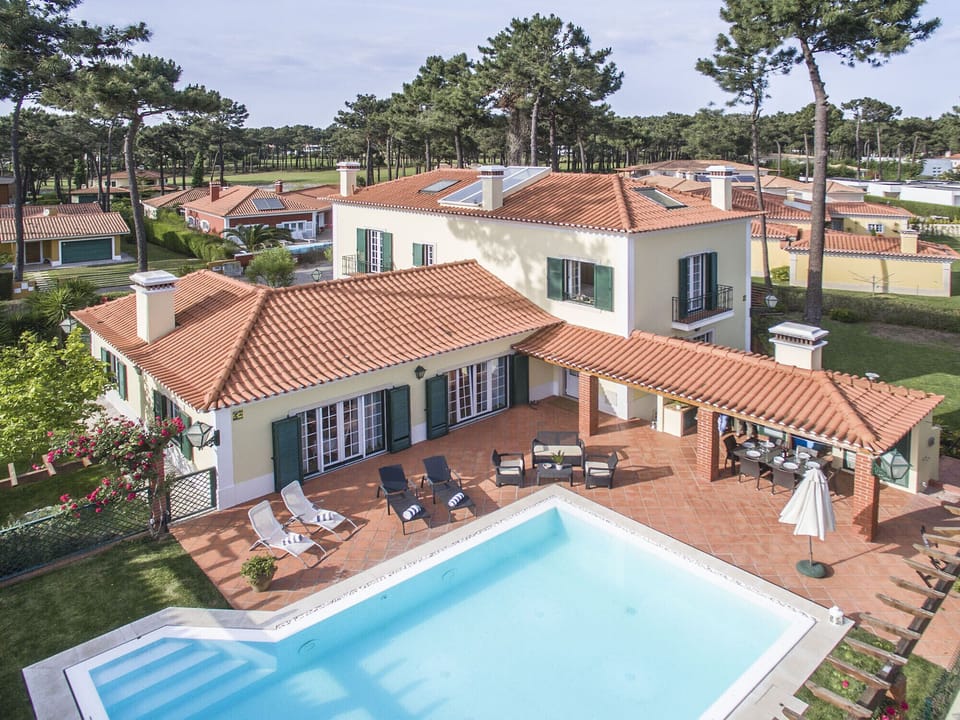Private pool and terracotta-roofed villa with sun terrace — Villa Gerbera, holiday villa in Herdade de Aroeira