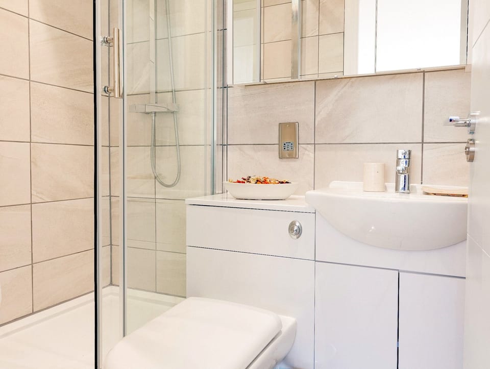 The Master Bedroom "Yellow Room", with an ensuite bathroom with shower & toilet