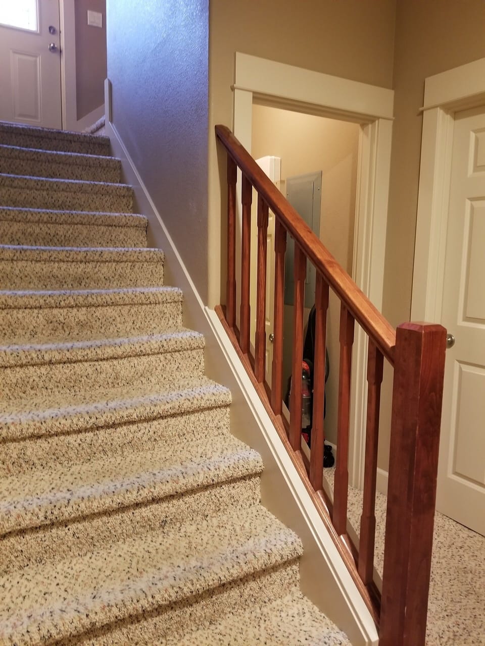 Moonbeams staircase between upper and lower levels.