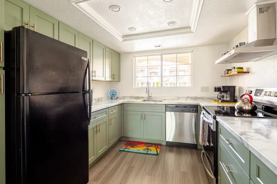 - Fully equipped kitchen with stainless steel appliances and sleek cabinetry   - Spacious countertops and modern design ideal for home cooking   - Convenient setup for preparing meals during y