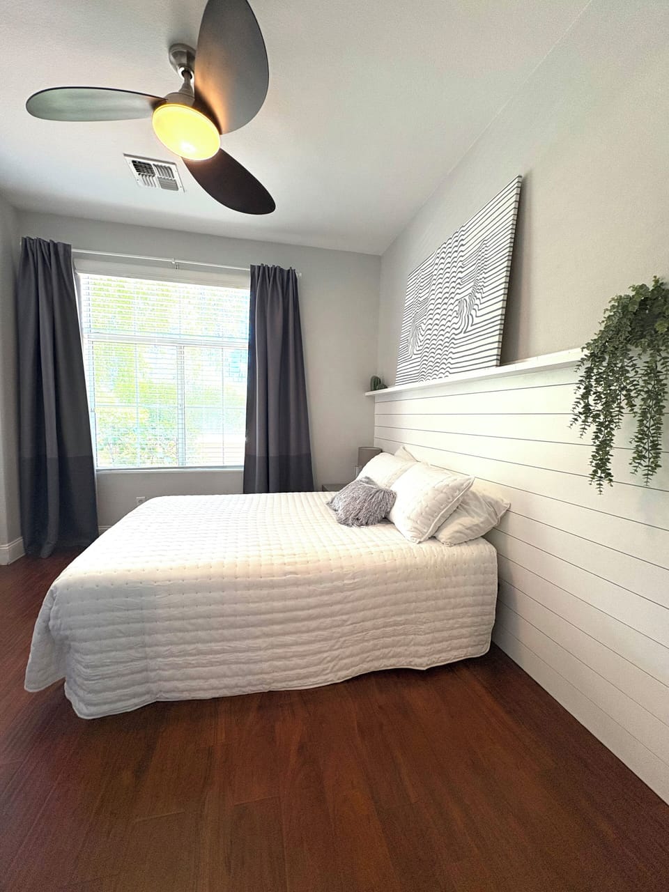 2nd bedroom with closet and a desk