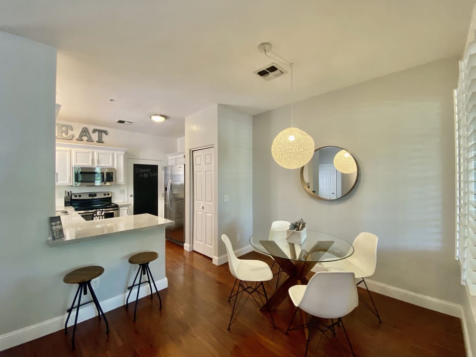 Dining room with seating at the breakfast bar 