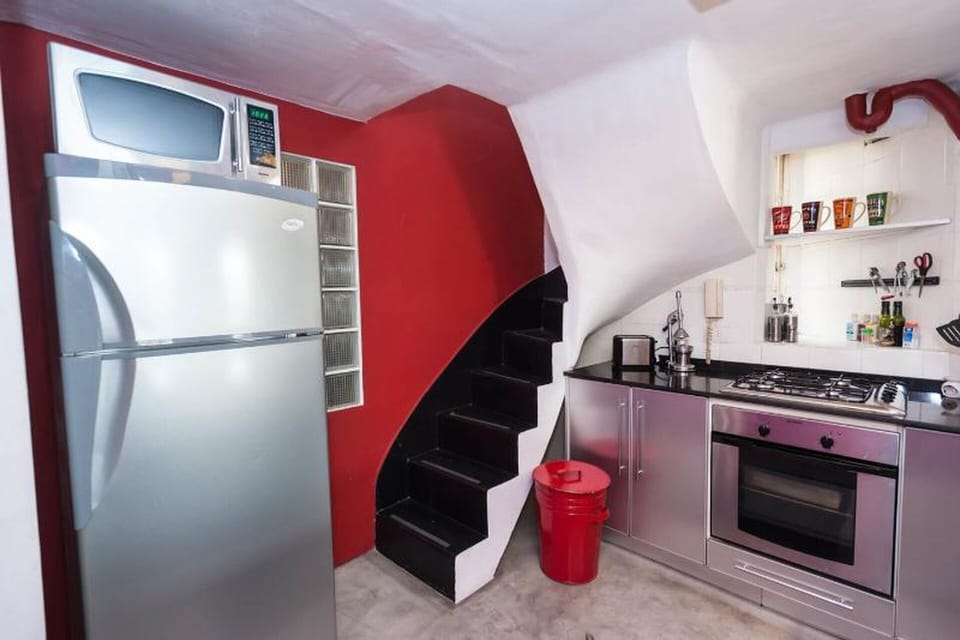 Kitchen + stairs to go to the office & laundry room