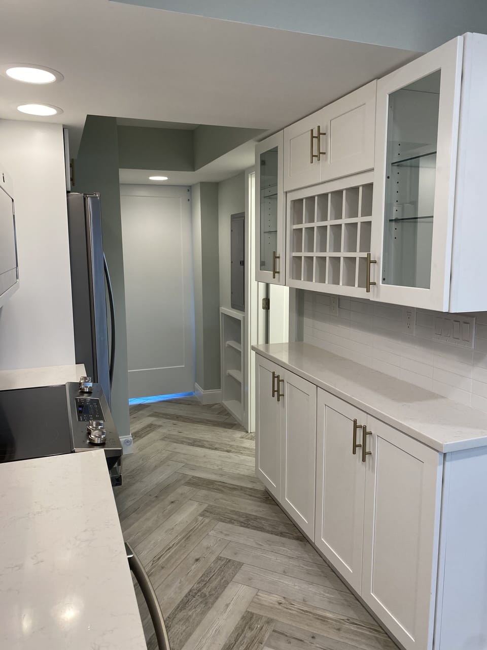 Additional kitchen storage and wine rack
