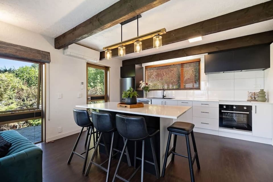 Fully equipped kitchen at Walk to Town 39A Alpine Chalet Queenstown holiday home