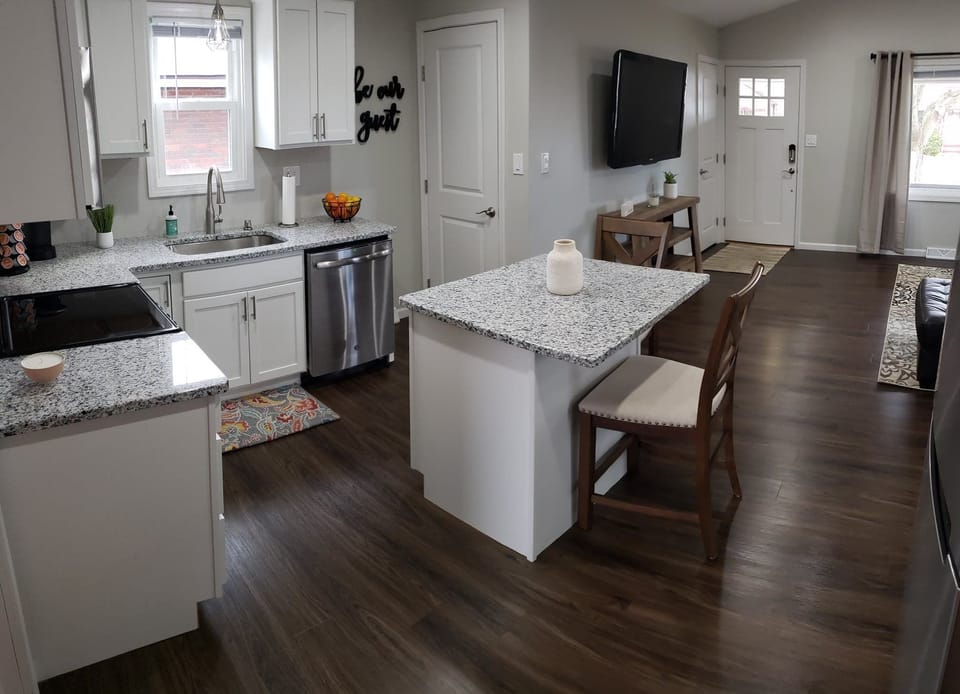Our open concept eat-in kitchen has all the necessary appliances and utensils!