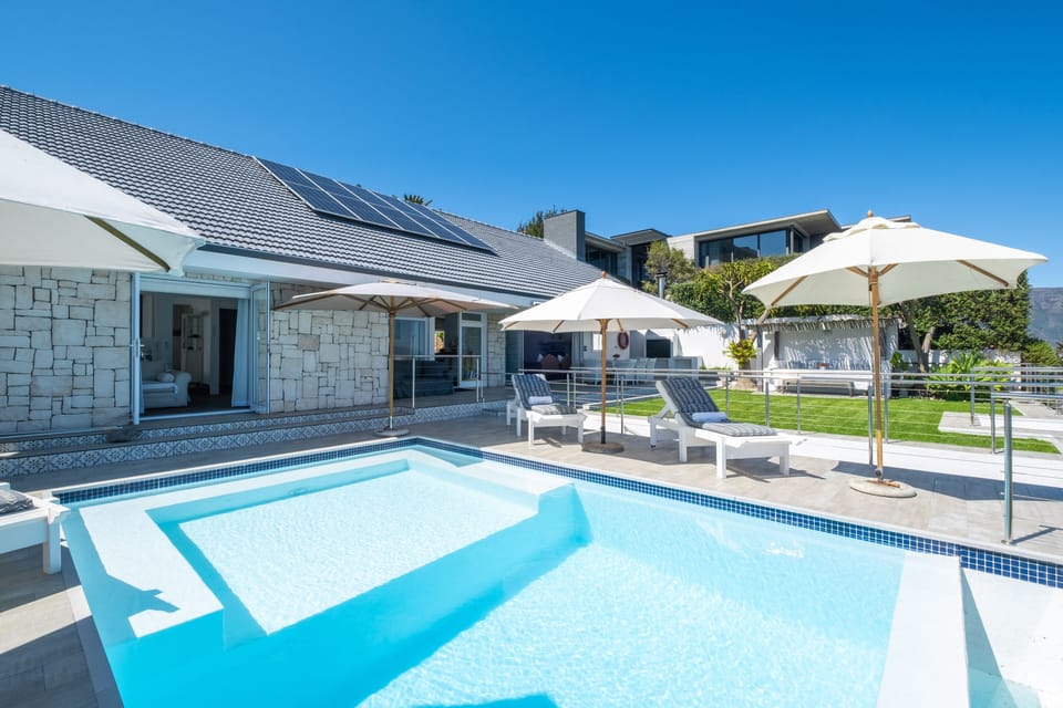 Infinity pool with grass area