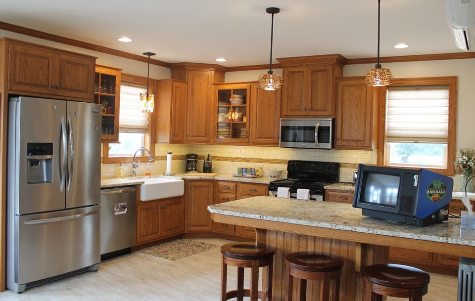 Kitchen filled with pots, pans and basic cooking needs 