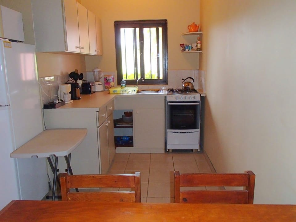 Fully equipped kitchen featuring convenient gas oven and range