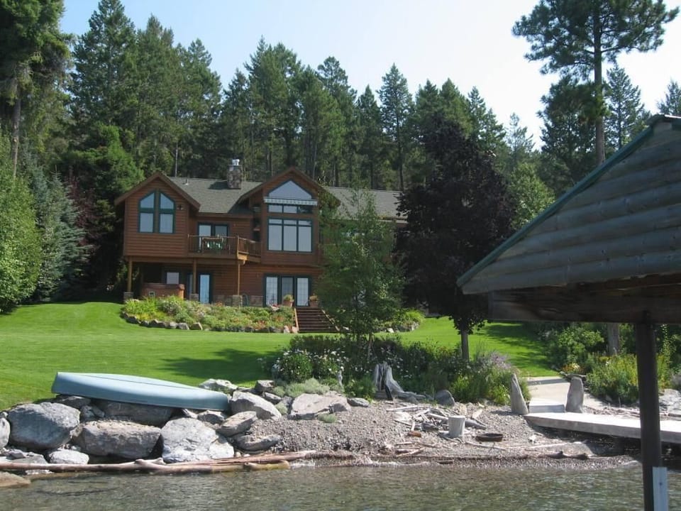 View of the house and private beach from the boat dock.