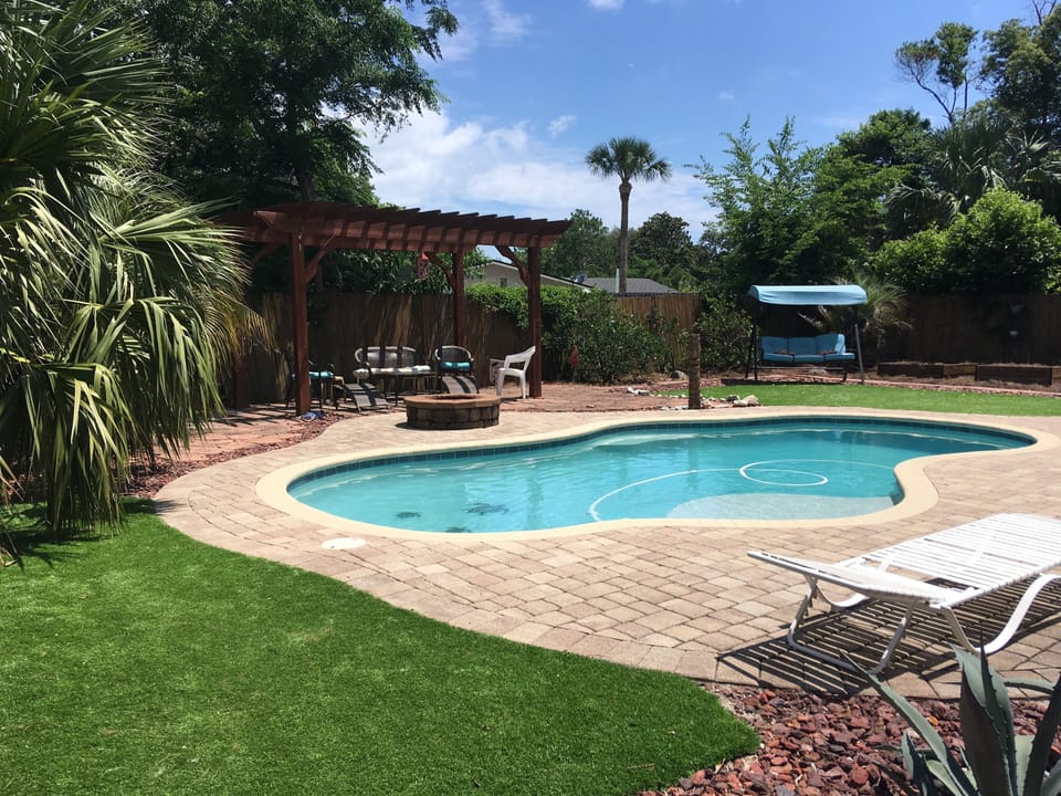 AstroTurf surrounding pool patio