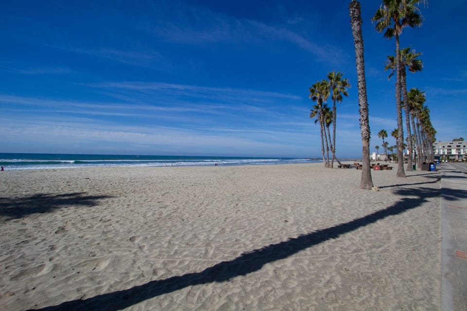 The beach is steps from the gate.