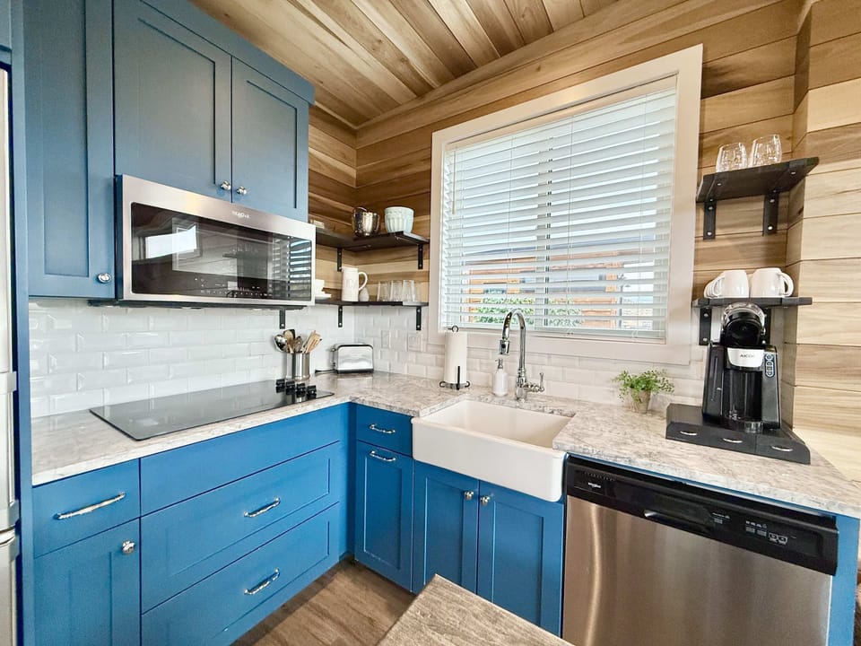 "The house was well equipped, clean, comfortable with a great view from the deck. The kitchen had everything we needed for 3 nights of cooking our own meals. We loved the tiny house (compact, efficient, attractive and well designed)..."